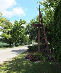 Sculptural artwork at the Knollwood Estates entrance